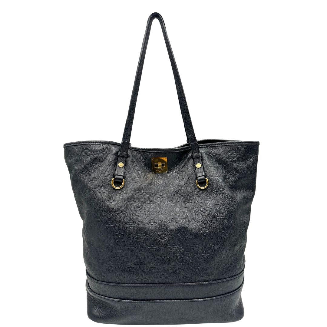 front Borsa Louis Vuitton in pelle blu monogram empreinte, di lusso, originale, ottime condizioni, usata. 