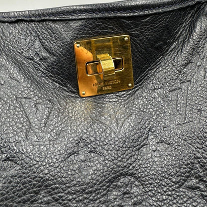 chiusura Borsa Louis Vuitton in pelle blu monogram empreinte, di lusso, originale, ottime condizioni, usata. 