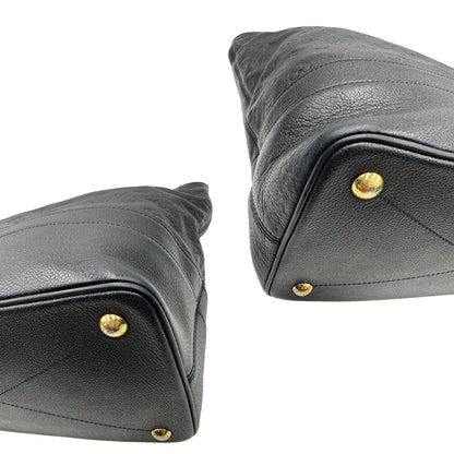 angoli Borsa Louis Vuitton in pelle blu monogram empreinte, di lusso, originale, ottime condizioni, usata. 