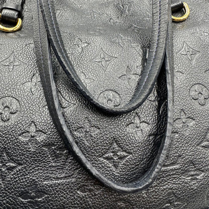 manici Borsa Louis Vuitton in pelle blu monogram empreinte, di lusso, originale, ottime condizioni, usata. 