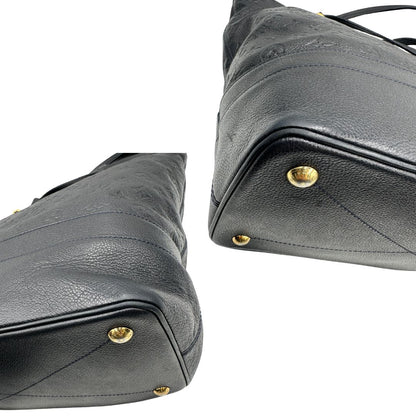 angoli Borsa Louis Vuitton in pelle blu monogram empreinte, di lusso, originale, ottime condizioni, usata. 