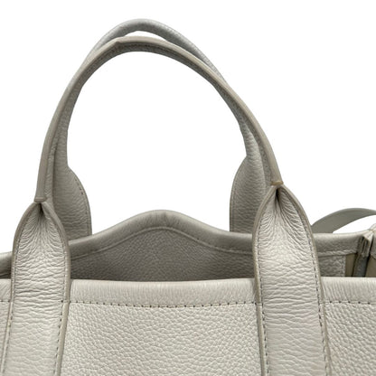 manici Borsa The Tote Bag Marc Jacobs in pelle bianca nella versione media, di lusso, originale, ottime condizioni, usata. 