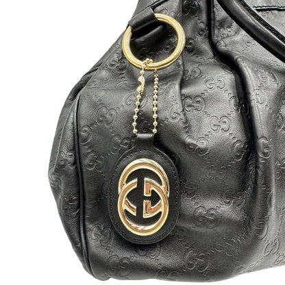 Borsa Gucci in pelle nera GG, munita di doppi manici, di lusso, originale, ottime condizioni, usata.