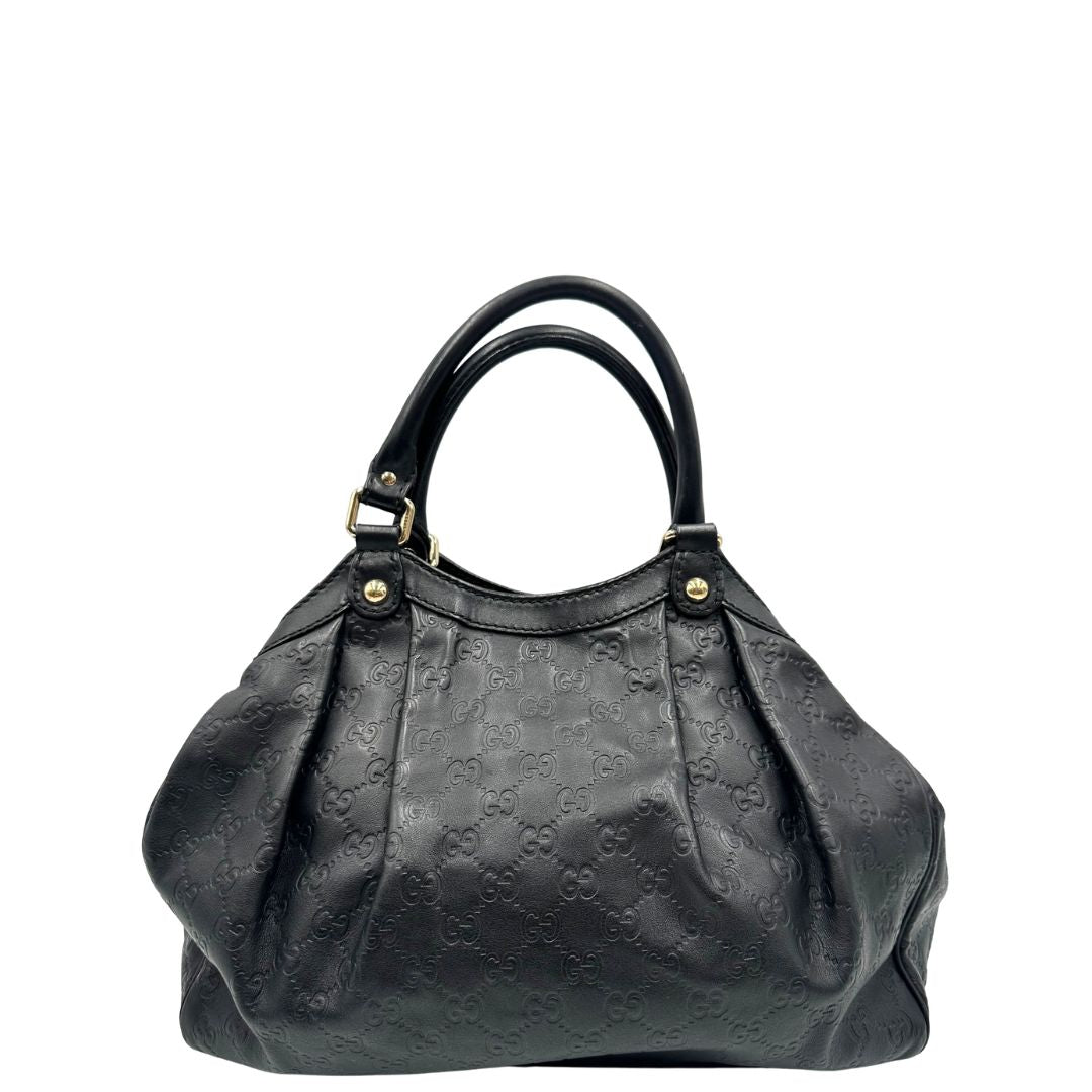 retro Borsa Gucci in pelle nera GG, munita di doppi manici, di lusso, originale, ottime condizioni, usata. 