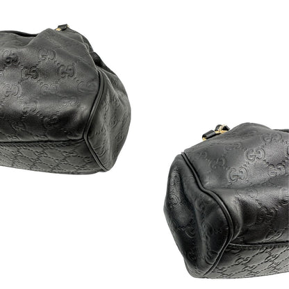 angoli Borsa Gucci in pelle nera GG, munita di doppi manici, di lusso, originale, ottime condizioni, usata. 