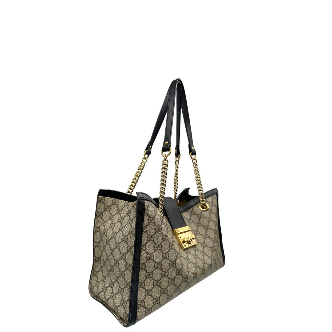 lato  Borsa Gucci Padlock con profili neri, di lusso, originale, ottime condizioni, usata. 