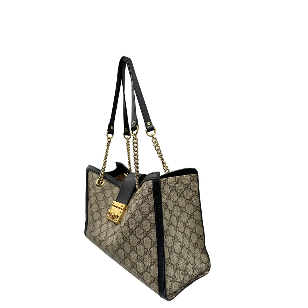 lato  Borsa Gucci Padlock con profili neri, di lusso, originale, ottime condizioni, usata. 