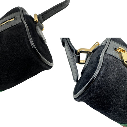 angoli  Borsa Gucci in pelle verniciata nera e pelle scamosciata tono su tono, impreziosita da striscia Web verde e rossa, di lusso, originale, ottime condizioni, usata. 