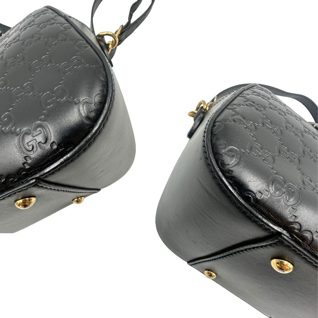 angoli Bauletto rigido Gucci in pelle nera Guccissima, di lusso, originale, ottime condizioni, usata. 