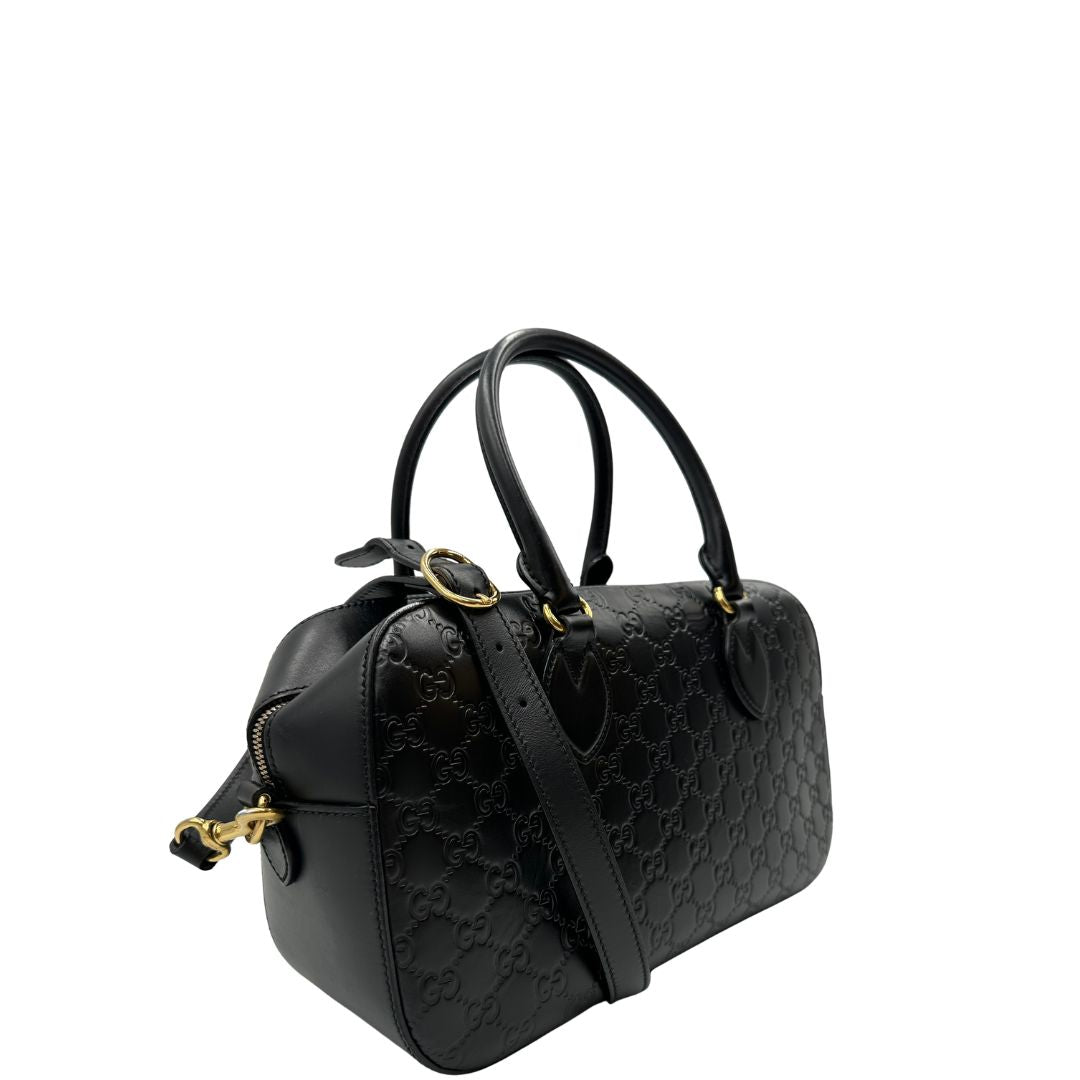lato Bauletto rigido Gucci in pelle nera Guccissima, di lusso, originale, ottime condizioni, usata. 
