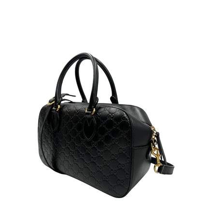 lato Bauletto rigido Gucci in pelle nera Guccissima, di lusso, originale, ottime condizioni, usata. 