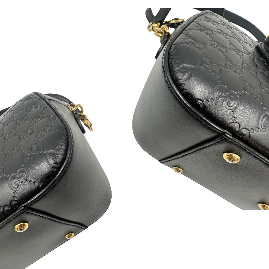 angoli Bauletto rigido Gucci in pelle nera Guccissima, di lusso, originale, ottime condizioni, usata. 