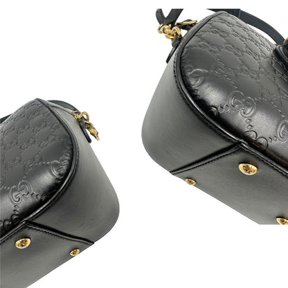 angoli Bauletto rigido Gucci in pelle nera Guccissima, di lusso, originale, ottime condizioni, usata. 