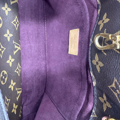 interno  Borsa LV Montaigne nella versione MM in canvas monogram, di lusso, originale, ottime condizioni, usata. 