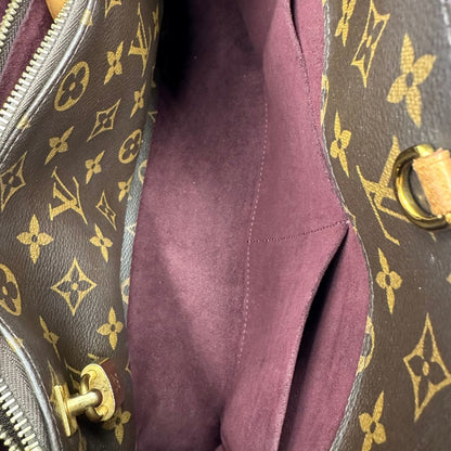 interno  Borsa LV Montaigne nella versione MM in canvas monogram, di lusso, originale, ottime condizioni, usata. 
