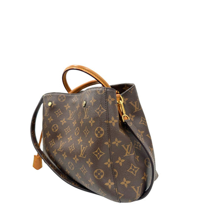 lato  Borsa LV Montaigne nella versione MM in canvas monogram, di lusso, originale, ottime condizioni, usata. 
