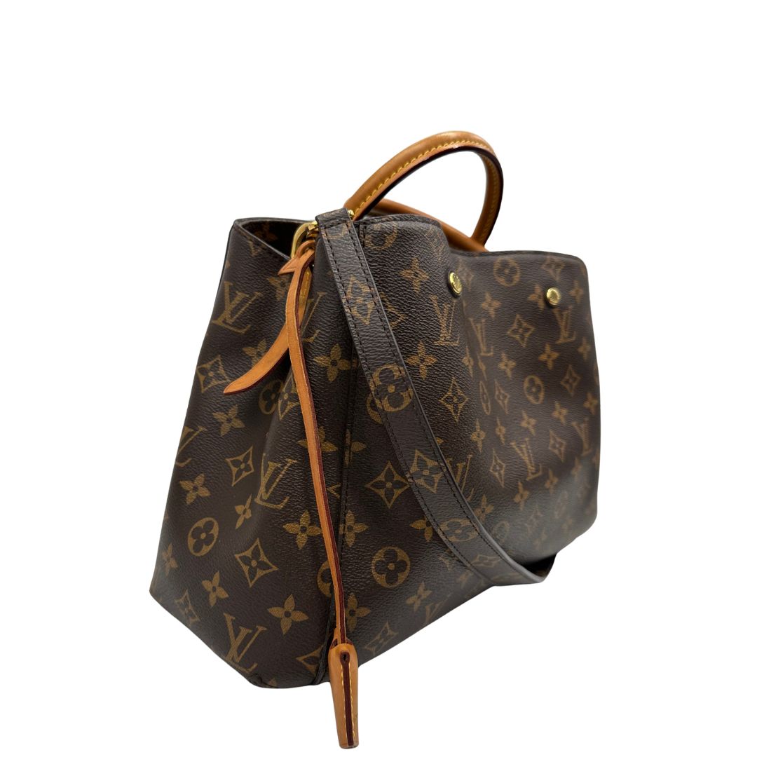 lato  Borsa LV Montaigne nella versione MM in canvas monogram, di lusso, originale, ottime condizioni, usata. 