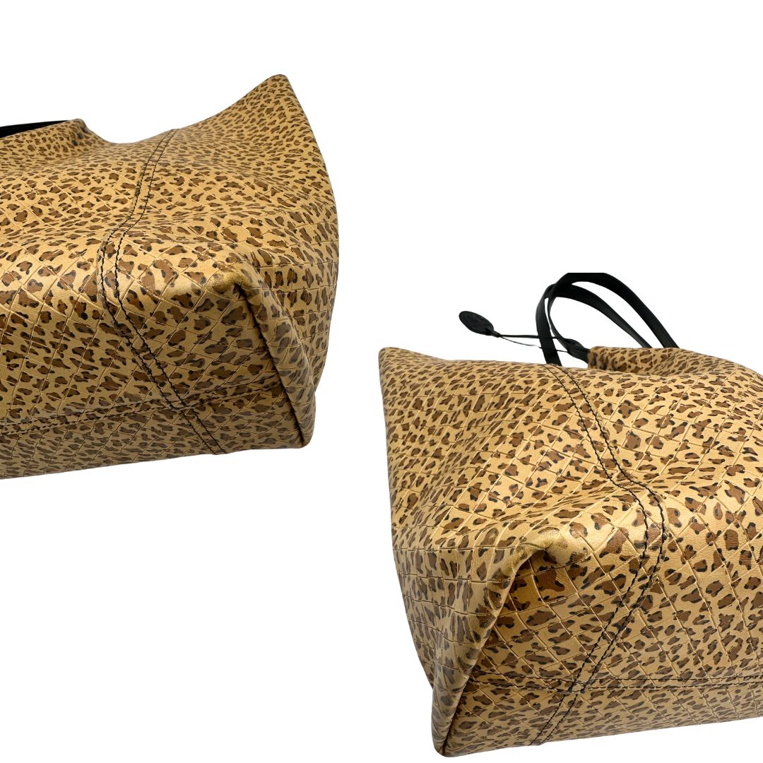 angoli Borsa Bottega Veneta trama animalier, indossabile a spalla, di lusso, originale, ottime condizioni, usata. 