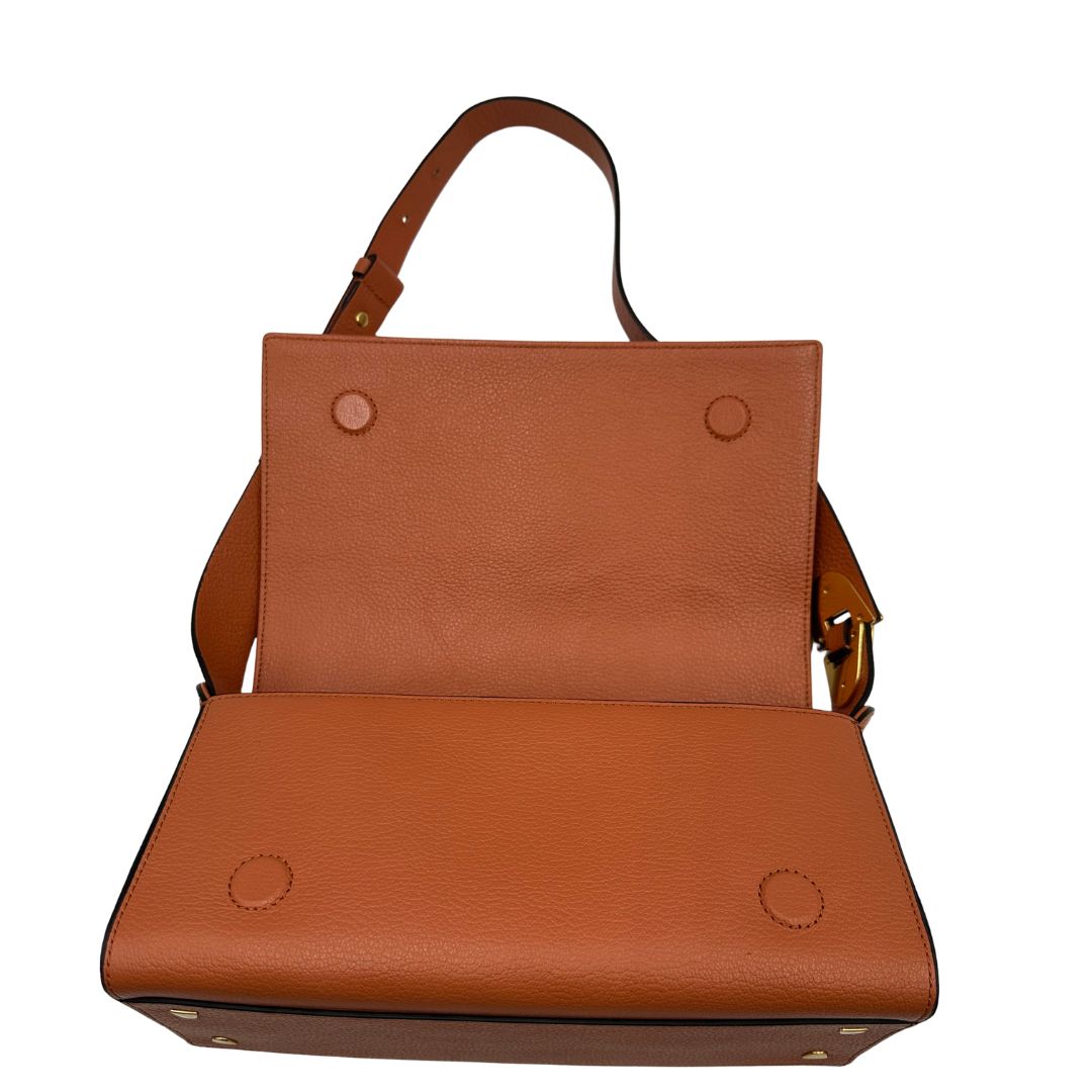 Borsa Coccinelle in pelle martellata color terracotta, di lusso, originale, ottime condizioni, usata.