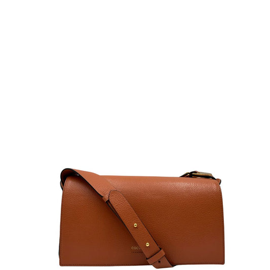 Borsa Coccinelle in pelle martellata color terracotta, di lusso, originale, ottime condizioni, usata.