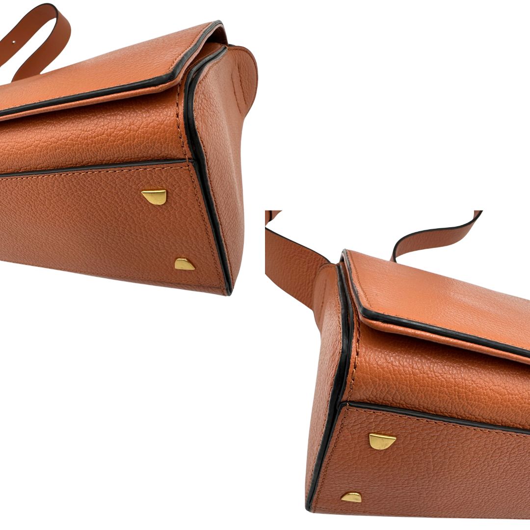 Borsa Coccinelle in pelle martellata color terracotta, di lusso, originale, ottime condizioni, usata.