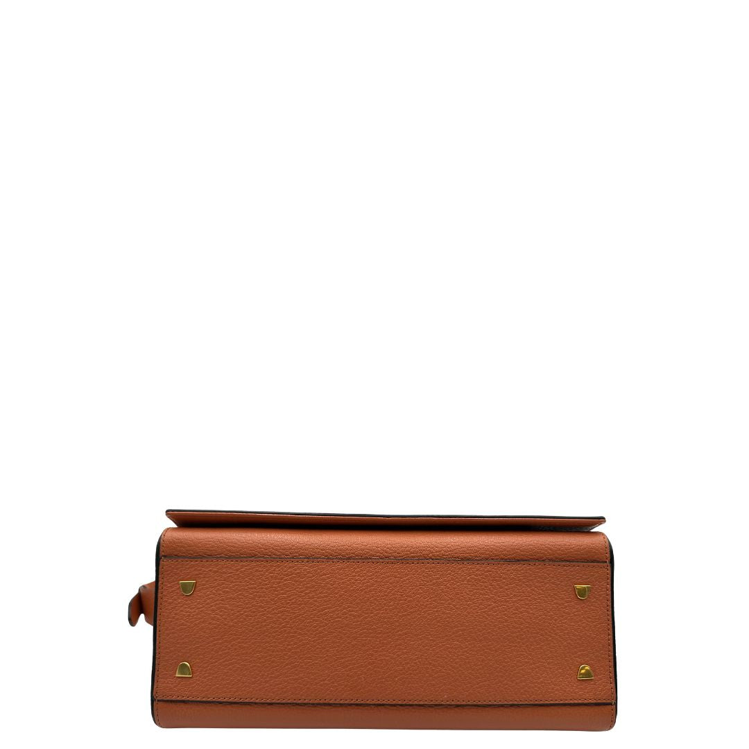 Borsa Coccinelle in pelle martellata color terracotta, di lusso, originale, ottime condizioni, usata.