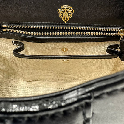 interno  Borsa Stirrup Gucci in pelle nera, indossabile a mano o a tracolla, di lusso, originale, ottime condizioni, usata. 