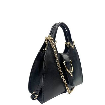 lato  Borsa Stirrup Gucci in pelle nera, indossabile a mano o a tracolla, di lusso, originale, ottime condizioni, usata. 
