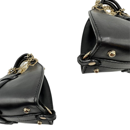 angoli  Borsa Stirrup Gucci in pelle nera, indossabile a mano o a tracolla, di lusso, originale, ottime condizioni, usata. 