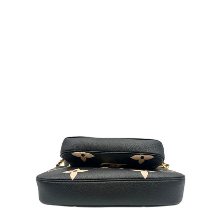 base  Borsa LV in pelle monogram empreinte nera e beige, di lusso, eccellenti condizioni, usata. 