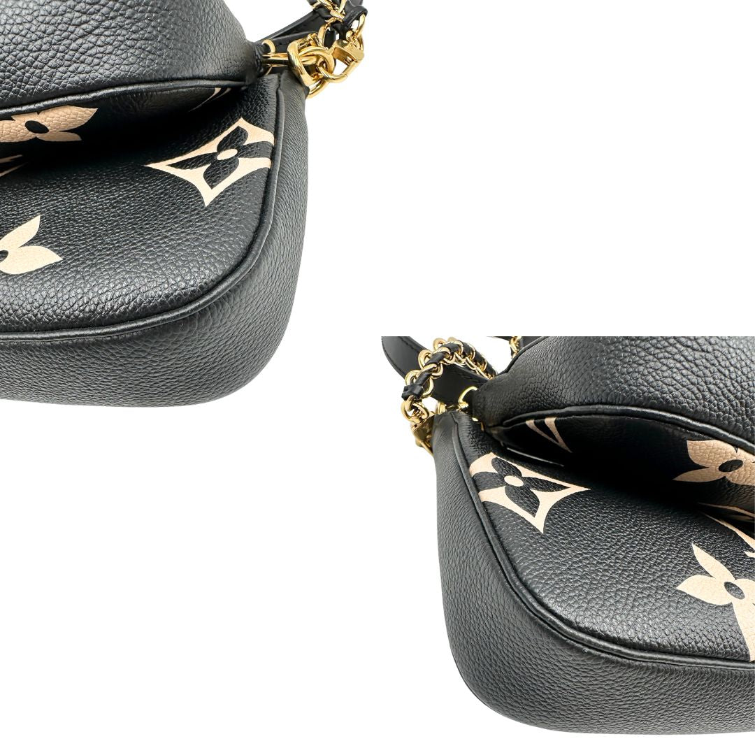 angoli  Borsa LV in pelle monogram empreinte nera e beige, di lusso, eccellenti condizioni, usata. 