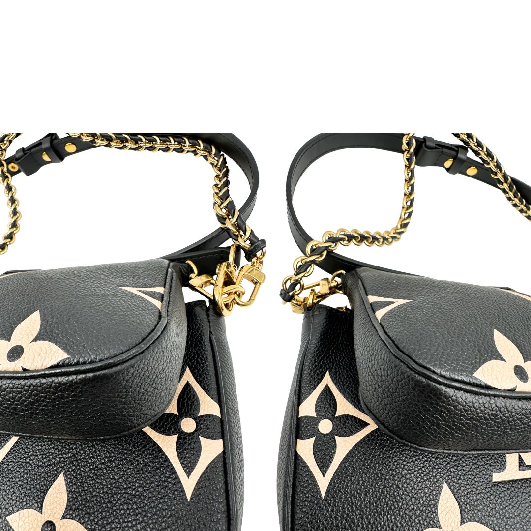 angoli  Borsa LV in pelle monogram empreinte nera e beige, di lusso, eccellenti condizioni, usata. 