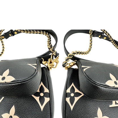 angoli  Borsa LV in pelle monogram empreinte nera e beige, di lusso, eccellenti condizioni, usata. 