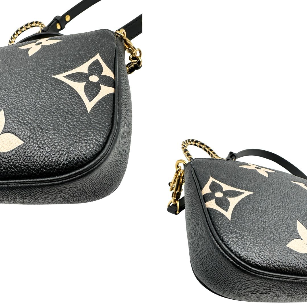 angoli  Borsa LV in pelle monogram empreinte nera e beige, di lusso, eccellenti condizioni, usata. 