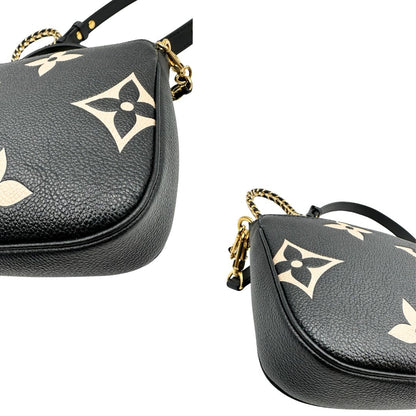 angoli  Borsa LV in pelle monogram empreinte nera e beige, di lusso, eccellenti condizioni, usata. 