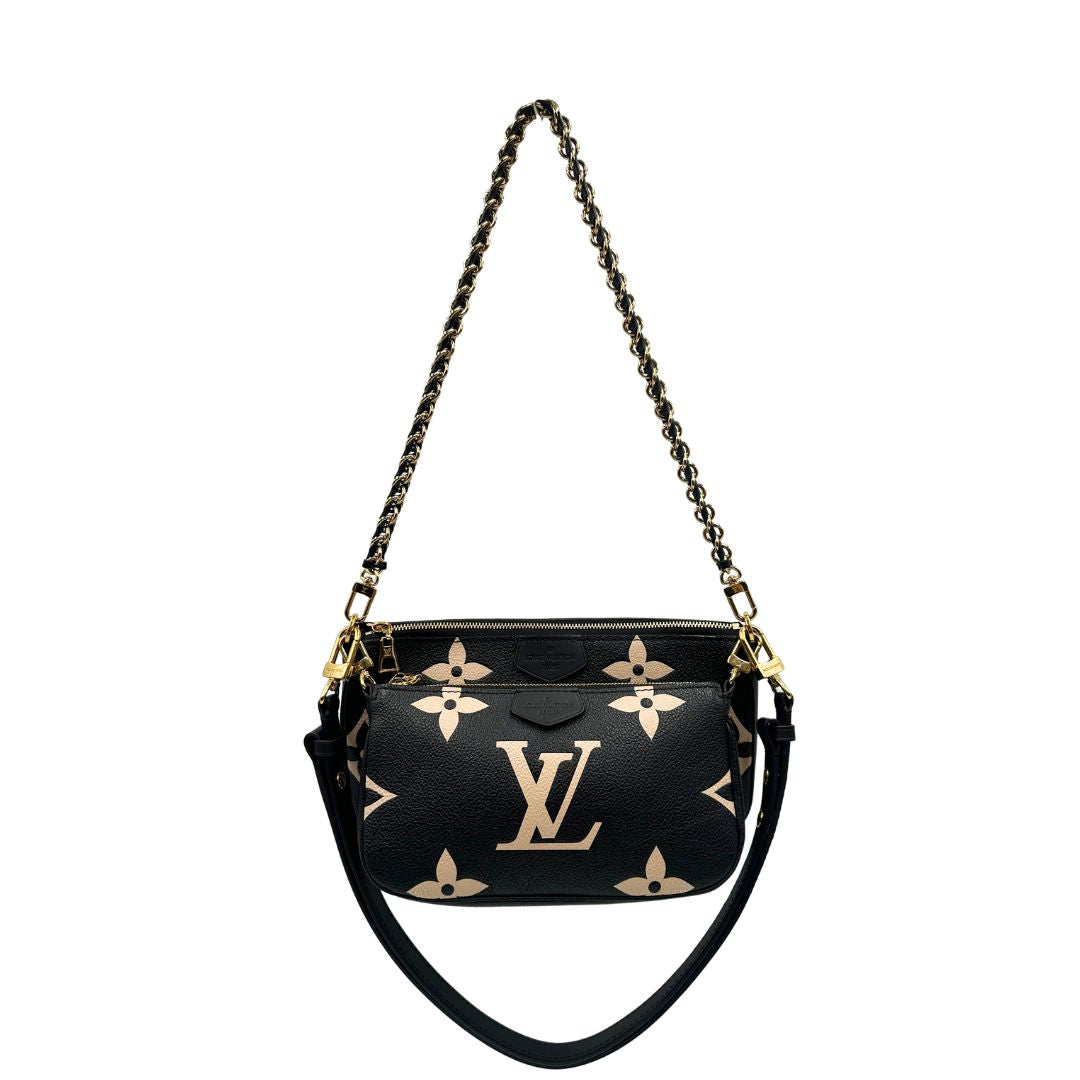 front  Borsa LV in pelle monogram empreinte nera e beige, di lusso, eccellenti condizioni, usata.