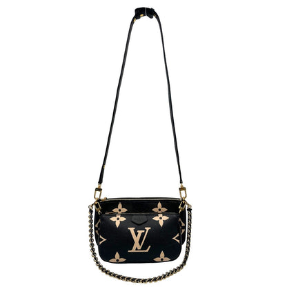 front  Borsa LV in pelle monogram empreinte nera e beige, di lusso, eccellenti condizioni, usata. 