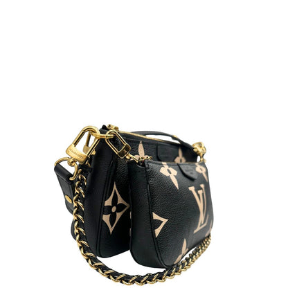 lato  Borsa LV in pelle monogram empreinte nera e beige, di lusso, eccellenti condizioni, usata. 