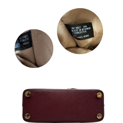 base Borsa MK in pelle saffiano color vinaccia, di lusso, originale, ottime condizioni, usata. 