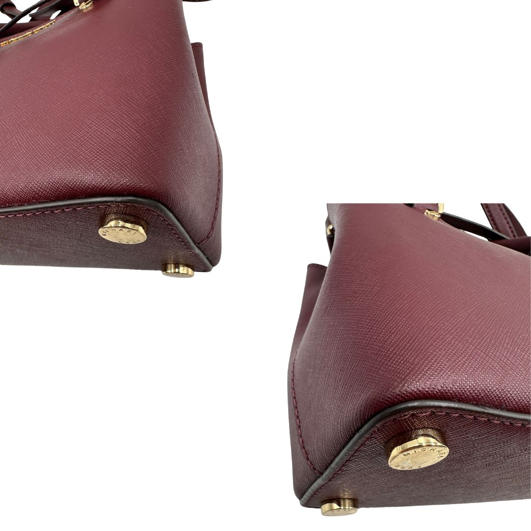 angoli Borsa MK in pelle saffiano color vinaccia, di lusso, originale, ottime condizioni, usata. 