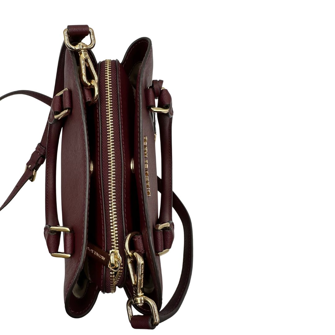 chiusura Borsa MK in pelle saffiano color vinaccia, di lusso, originale, ottime condizioni, usata. 