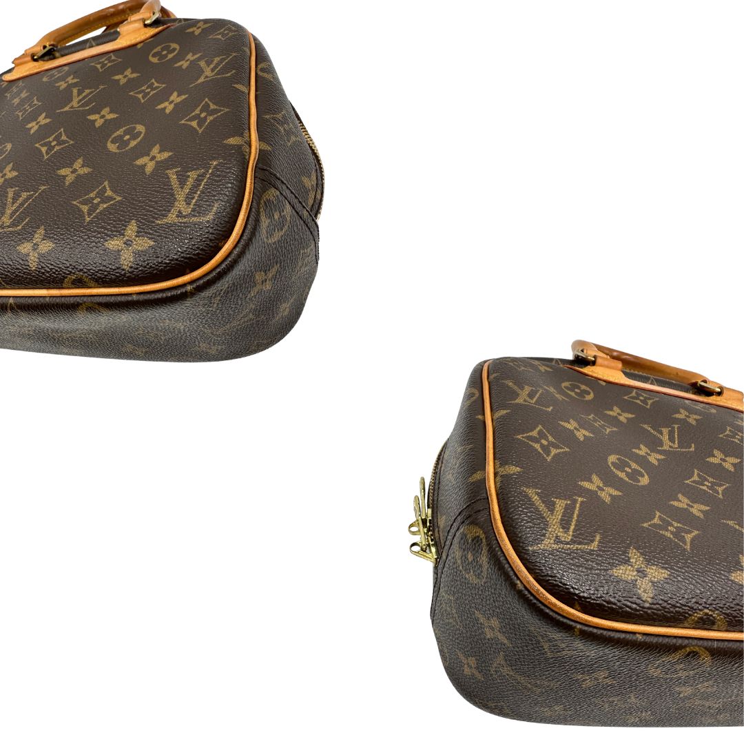 angoli Borsa LV Trouville in tela monogram e vacchetta naturale, di lusso, originale, ottime condizioni, usata. 