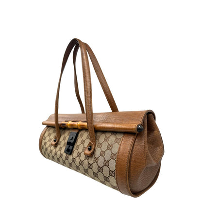 lato Borsa Gucci in tessuto GG con dettaglio bamboo, di lusso, originale, ottime condizioni. 