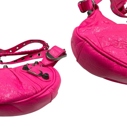 angoli Borsa Le Cagole XS in pelle Arena fucsia, di lusso, originale, ottime condizioni, usata 
