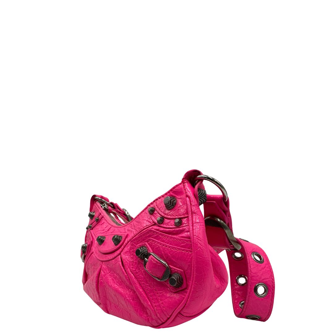 lato Borsa Le Cagole XS in pelle Arena fucsia, di lusso, originale, ottime condizioni, usata 