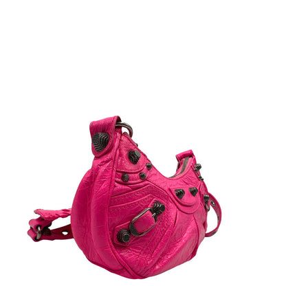 lato Borsa Le Cagole XS in pelle Arena fucsia, di lusso, originale, ottime condizioni, usata 