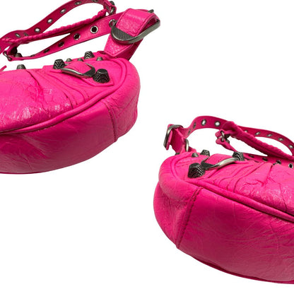 angoli Borsa Le Cagole XS in pelle Arena fucsia, di lusso, originale, ottime condizioni, usata 