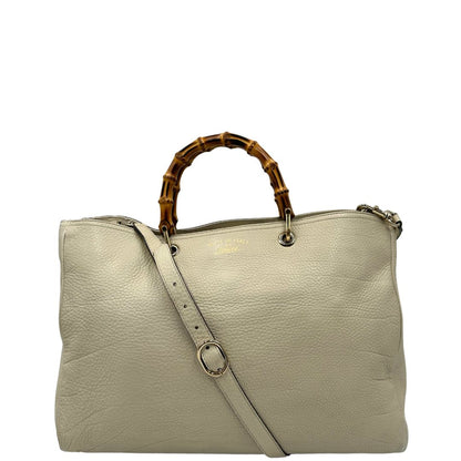 front Borsa Gucci in pelle bianca con manici bamboo, di lusso, originale, ottime condizioni, usata. 