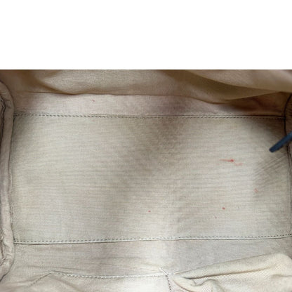 Interno di una borsa a mano Burberry in canvas tartan e finiture nere lucide, usata, originale, second hand, in ottime condizioni.