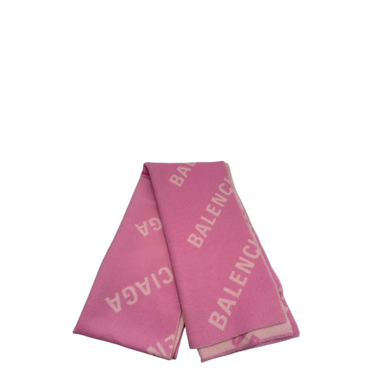 Sciarpa Balenciaga in 100% lana rosa con il monogramma del brand ripetuto su entrambi i lati. Originale, usata, di lusso, in ottime condizioni.